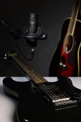 Obraz na płótnie Canvas Guitars and Studio microphone