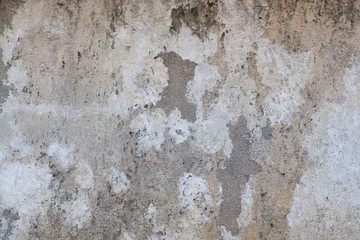 Stone and cement grungy old vintage gray outdoor wall surface