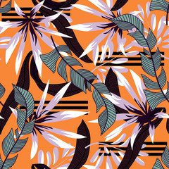Abstract tropical seamless pattern with colorful leaves and bright plants on orange background. Vector design. Jungle print. Floral background. Printing and textiles. Exotic tropics. Fresh design.