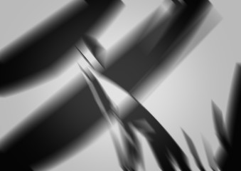 Black and white abstract shapes, dark background.