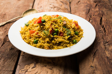 Tomato  pulav/Pilaf made using basmati rice, served in a bowl. selective focus
