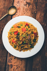 Tomato  pulav/Pilaf made using basmati rice, served in a bowl. selective focus