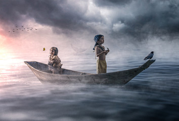 Dramatic scene of two lost children drifting in the ocean © trafa