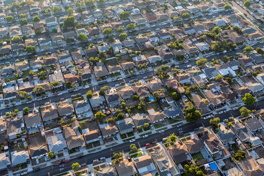 Afternoon aerial view of residential homes and streets in the south bay area of Los Angeles County, California.  