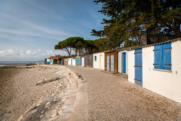 Obraz premium tiny colorful houses made of wood on the beach