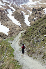 Fototapeta premium Hiker with traditional papakha fur hat at Mtskheta-Mtianeti region in Georgia
