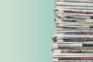 Pile of newspapers on background