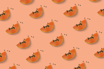 Orange papaya pattern top view on the minimal pastel background