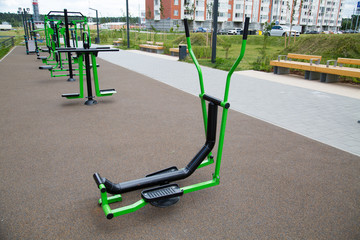 Ski simulator metal on the Playground in the city outdoors. Sport healthy lifestyle Hobbies.