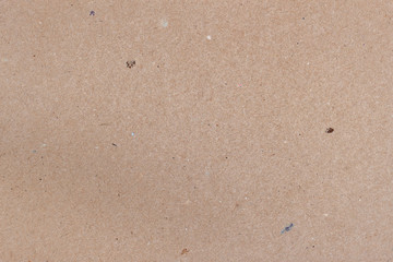 Vintage paper texture cardboard background close-up. Grunge old paper surface texture.
