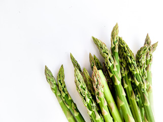 Fresh green asparagus on white background. Healthy food. Culinary for vegitarians, recipe, vitamins.