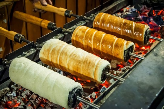 BUDAPEST, HUNGARY. December 16, 2017. Traditional Hungarian trozkol spit cake (kurtosh kalach in Hungarian) grilled in the streets of Budapest.