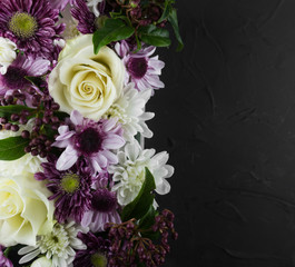 Photo background of white roses, white and purple chrysanthemums. Macro photo flowers.