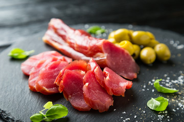 Smoked pork tenderloin. Pork carpaccio