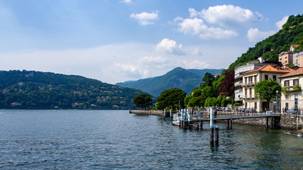 Fototapeta na wymiar View above big beautiful lake, Como lake, Italy. Summer cloudy view.
