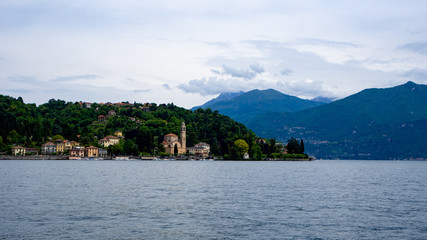 View above big beautiful lake, Como lake, Italy. Summer cloudy view.