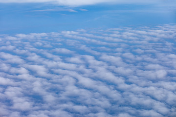 Naklejka premium landscape above white clouds