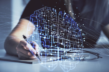 Multi exposure of woman's writing hand on background with brain hologram. Concept of brainstorming.