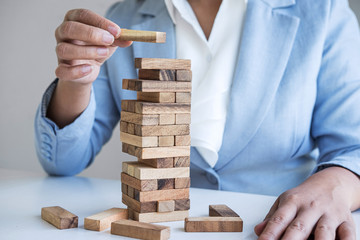 Alternative Risk and Strategy in Business, Hand of intelligent business woman gambling placing...