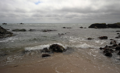 Fototapeta na wymiar Beautiful rocks formations on the Pacific Ocean near Half Moon Bay, California