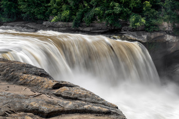 Brink of Cumberland Falls - Whitewater courses over Cumberland Falls, a large waterfall in southeastern Kentucky.