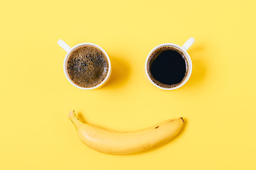 Silly smiling happy face of two cups