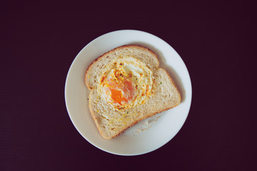Fried egg in bread slice