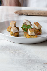 Merluza sobre verdura. Hake on vegetables.