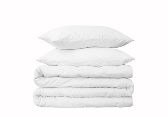 Fototapeta na wymiar Stack of two pillows and on the white background, two white pillows on the rolled duvet isolated, bedding objects isolated against white background, bedding items catalog illustration, bedding mock up
