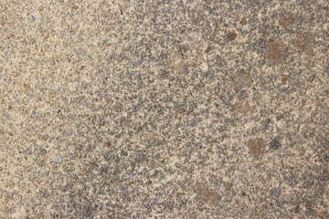 Beige stone pebble wall texture