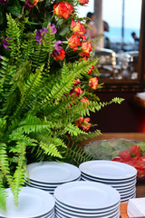 white dishes stacked on the buffet table