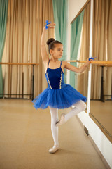 Little ballerinas in ballet studio