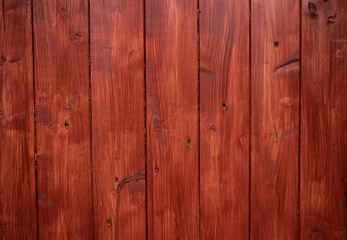 Naklejka premium red stained wood gate pannel texture