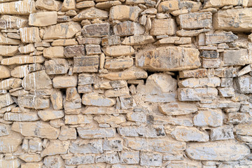 Ancient stone wall background. Pano Lefkara, Cyprus.