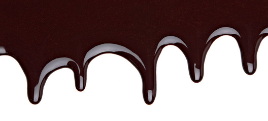 Melted chocolate dripping isolated on white background