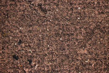 Rust coloured ground texture shot