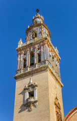 Fototapeta na wymiar Tower with blue tiles of the Santa Maria church in Ecija, Spain