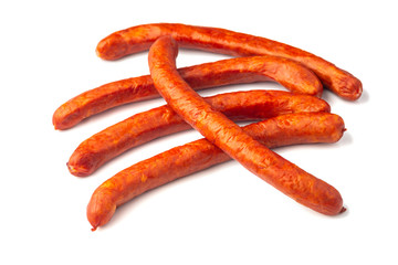Smoked sausages isolated on a white background