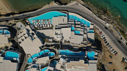 Aerial drone photo of Cavo Tagoo luxury resort famous for number of pools in new public port of Mykonos island, Cyclades, Greece