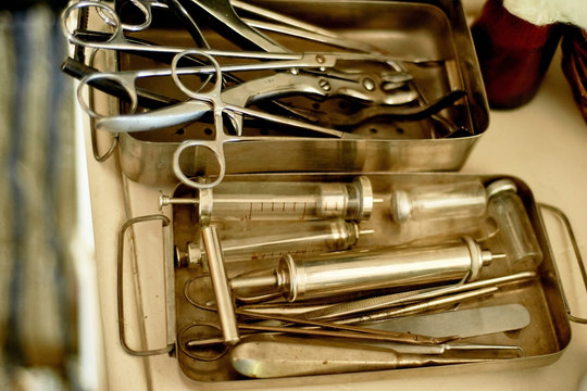 Old Medical Instruments In A Metal Box. Retro Tool