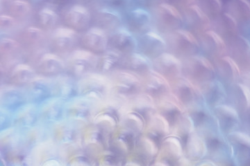 Defocused or blurred image of multi-colored lights. Bokeh effect. Abstract background, selective focus.