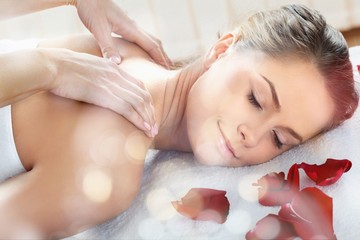 Fototapeta na wymiar Beautiful young woman relaxing with massage