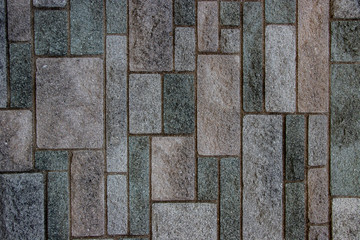 Green and grey brick wall texture