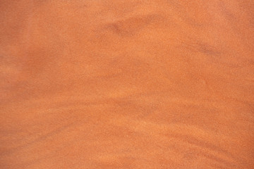 abstract background, shiny metallic paint with waves abstract background, golden,gold metallic paint ink with waves on surface with shiny sparkling