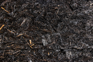 Black painted wood chip texture