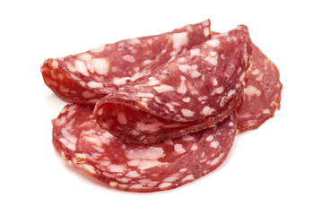 Sliced Dried sausage or salami, smoked meat, close-up, isolated on white background