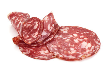 Sliced Dried sausage or salami, smoked meat, close-up, isolated on white background