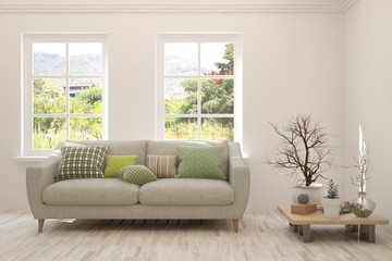 Stylish room in white color with sofa and summer landscape in window. Scandinavian interior design. 3D illustration