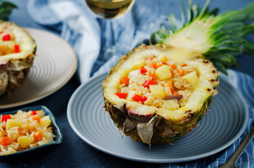 Bacon chicken pine apple vegetables fried rice in pineapples