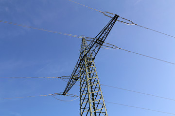 Transmission line on background of blue sky